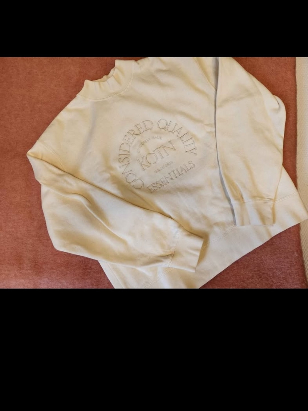 KOTN Cream Crewneck Sweatshirt with Embossed Logo